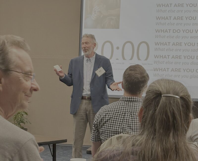 Bill teaching a room of couples
